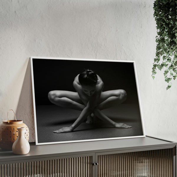 A woman in a yoga pose against a dark grey and black background with wooden frame 2