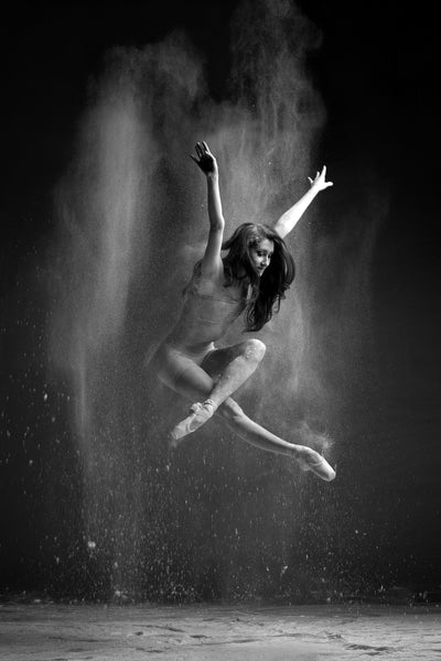 Art Dance Photography Prints - Purchase Online the artwork: Dancer solo in the air jumping flying with the hands in the air and looking down to the floor in black and white photo by Francsico Estevez