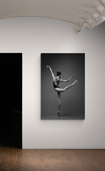 Extra Large Artwork Print on a hallway wall. Ballerina, en pointe, dancing, attitude. Photo print studio, back shoot, colors black and white.