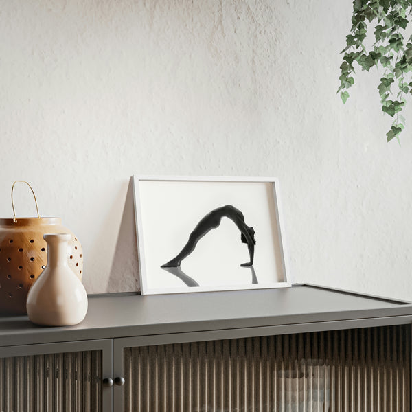 Woman doing yoga pose in white against white background print on a living room shelf